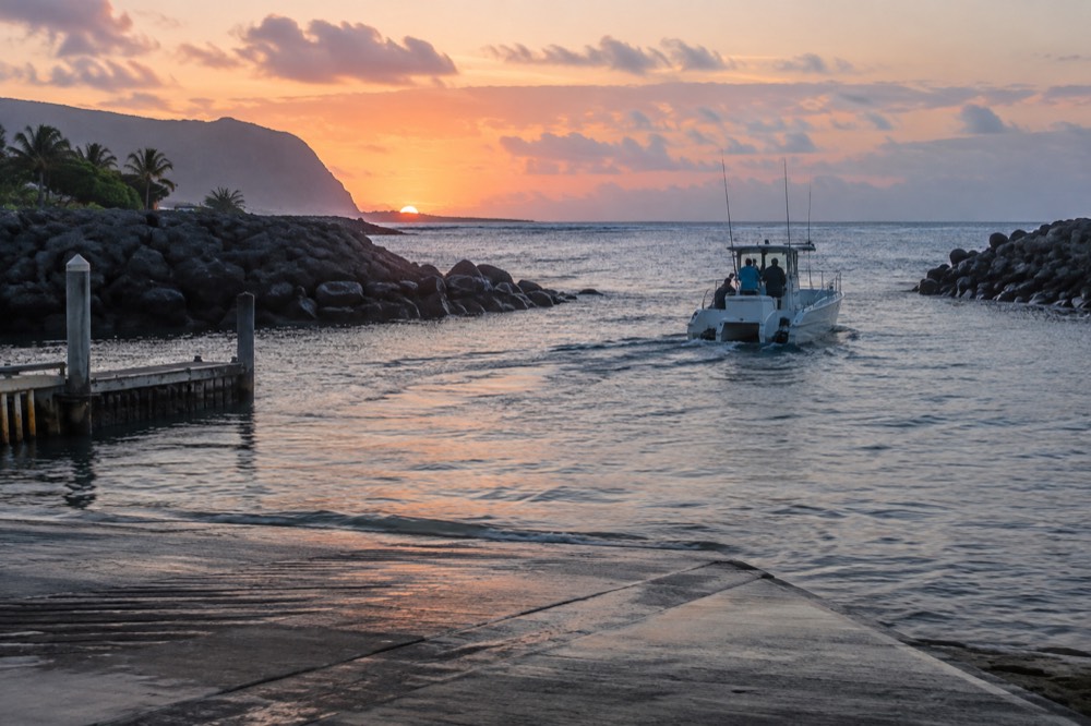 A small boat harbor on Kauai's south-west shore at first light