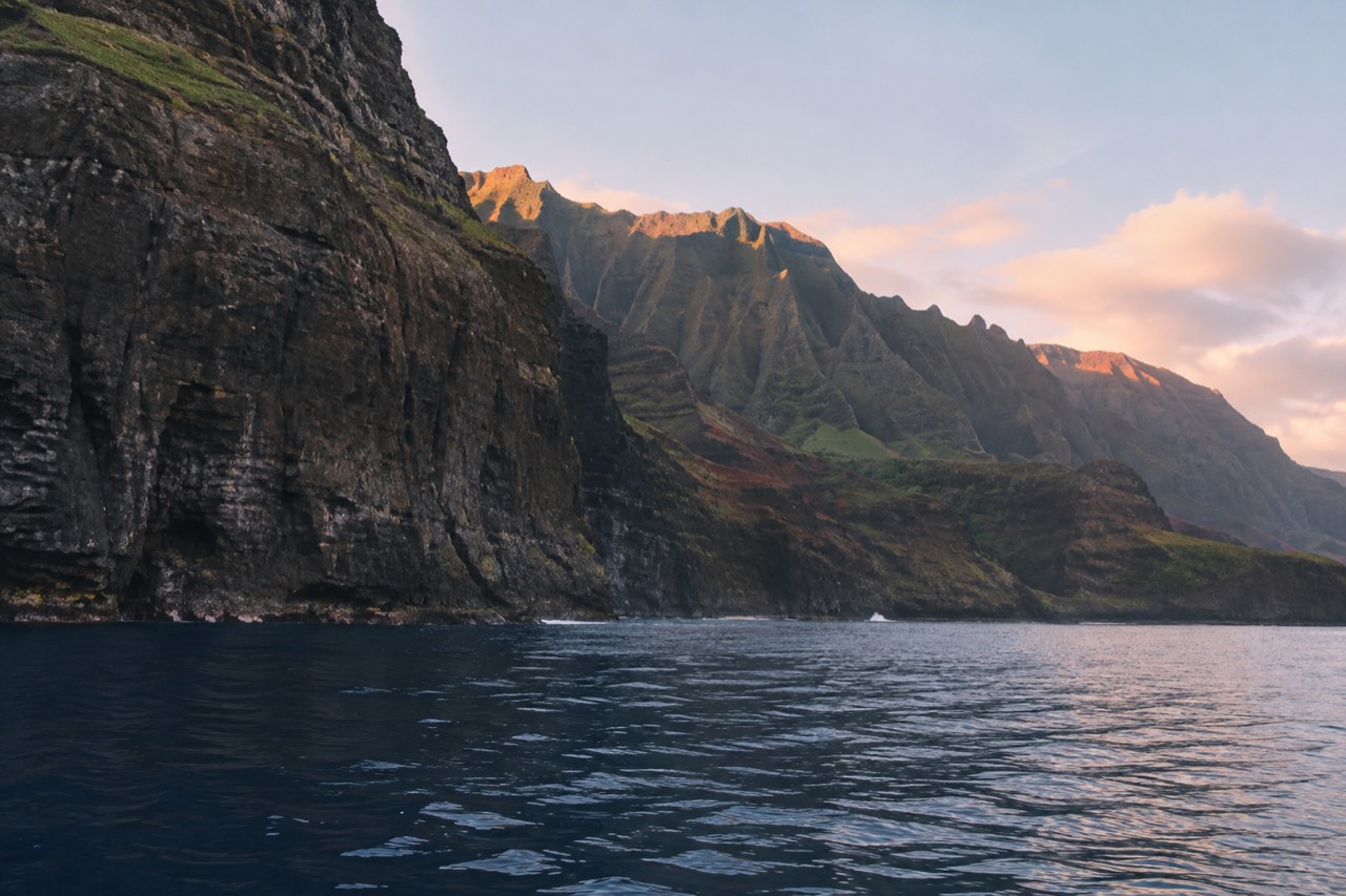 Calm morning water along the Napali Coast sea cliffs on Kauai