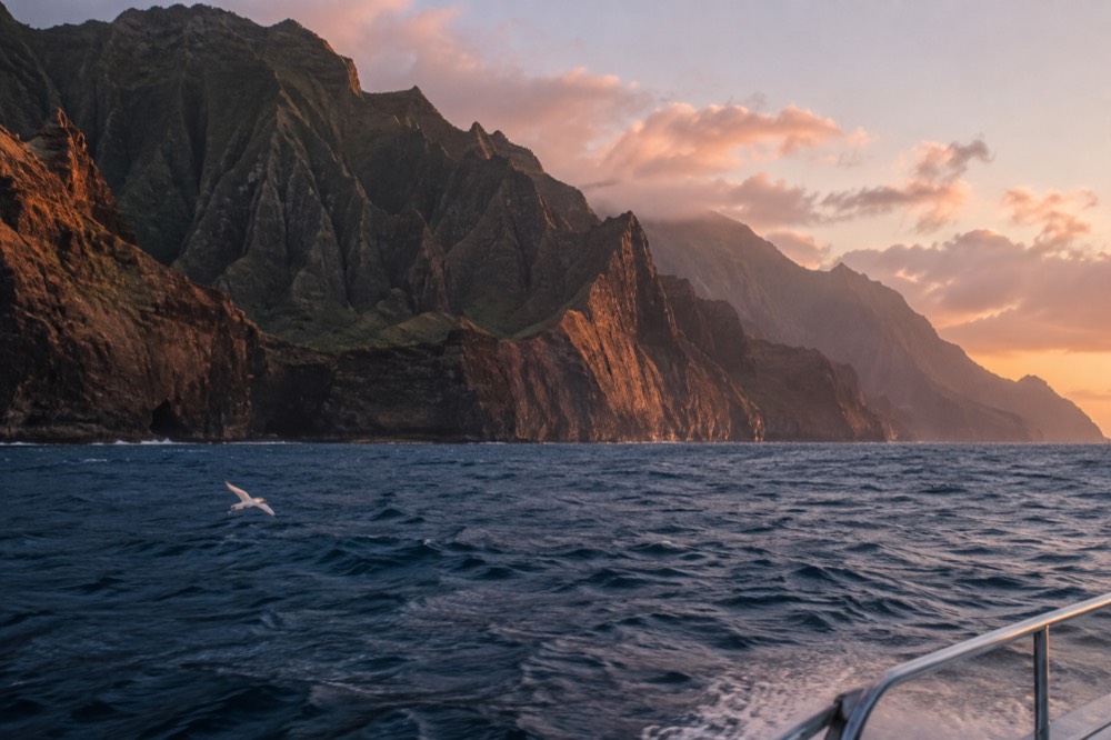 Twilight settles over the Napali Coast sea cliffs of Kauai